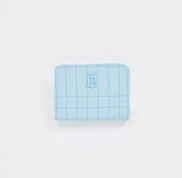 TB로고가 돋보이는 양가죽 소재의 여성 지갑