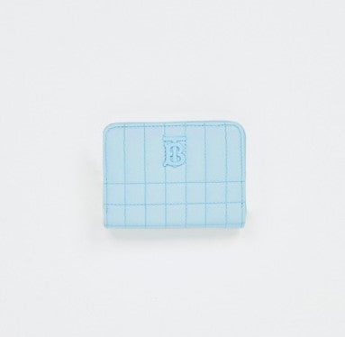 TB로고가 돋보이는 양가죽 소재의 여성 지갑