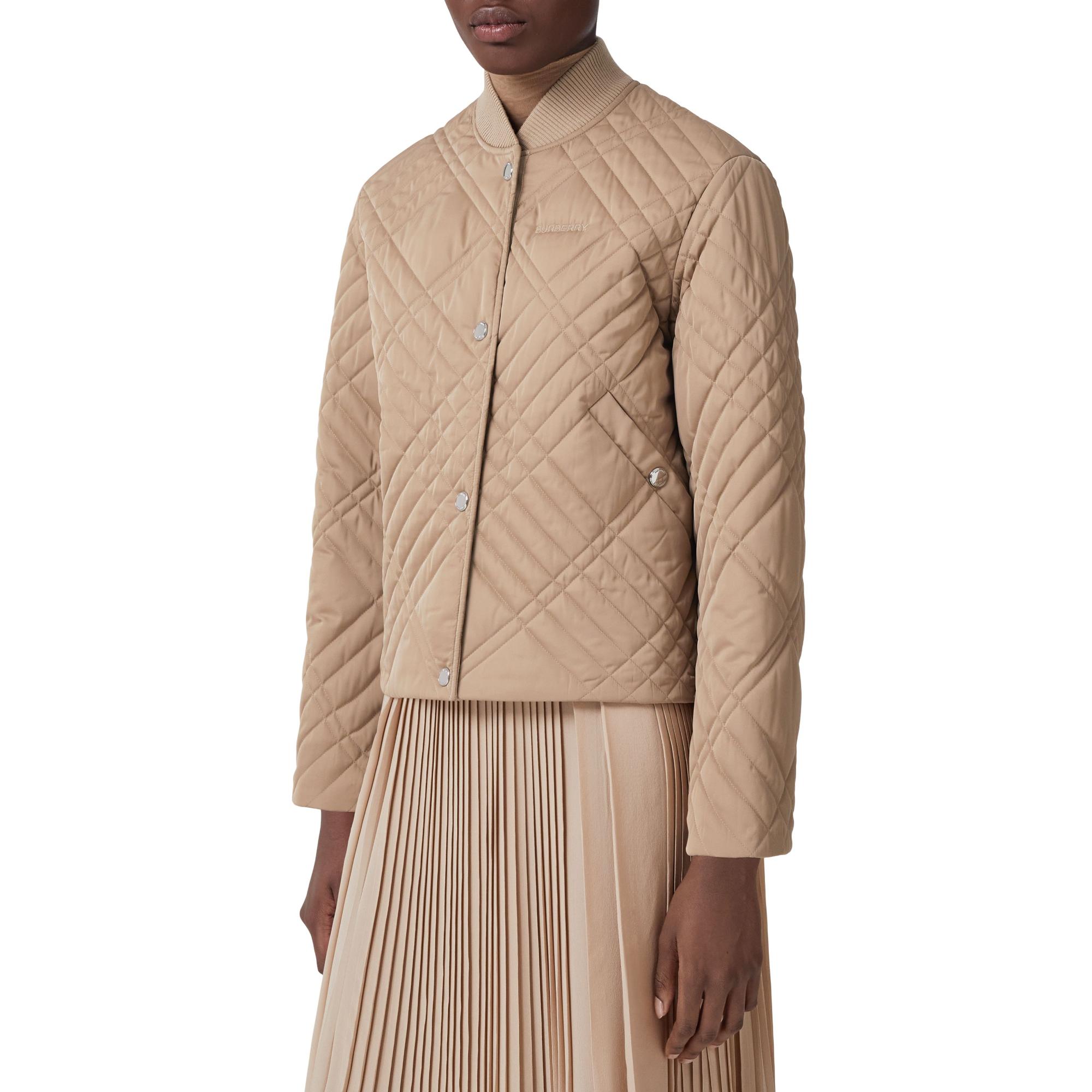 로고 디테일 라이트 퀼팅 재킷